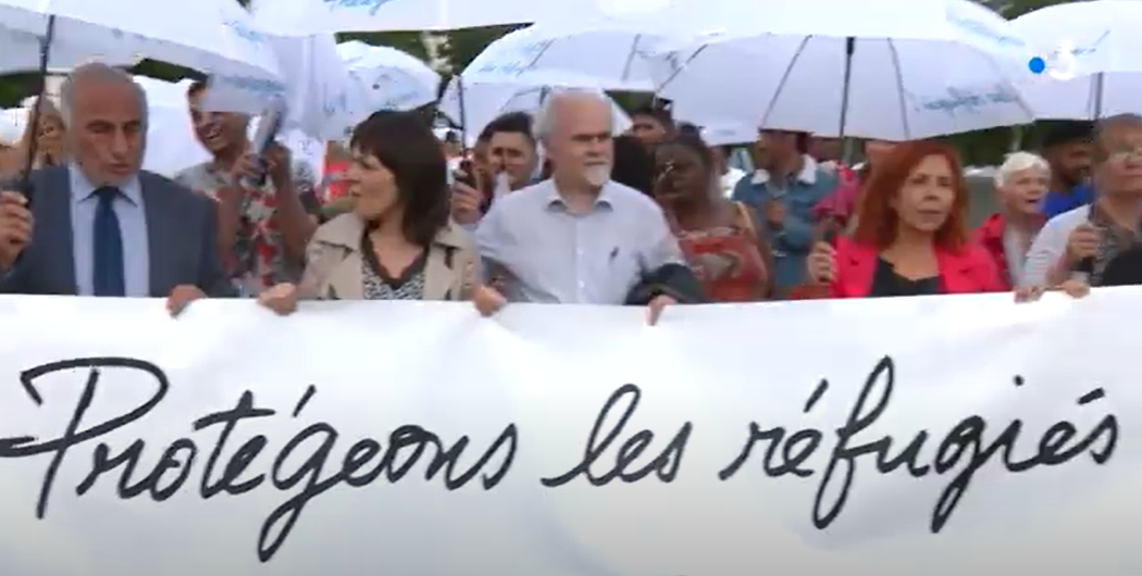  France 3 : A l’occasion de la Journée mondiale des réfugiés, une nouvelle marche des parapluies a été organisée à Lyon.